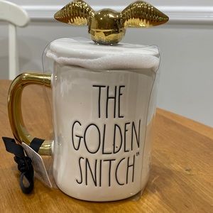 NWT.  Rae Dunn, 24oz., “Harry Potter - Golden Snitch”, ceramic mug with lid.